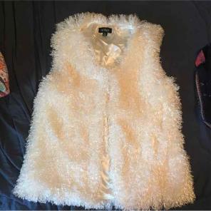 White poodle vest.
