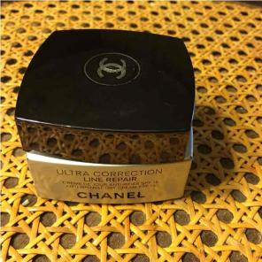Empty Chanel cream bottle