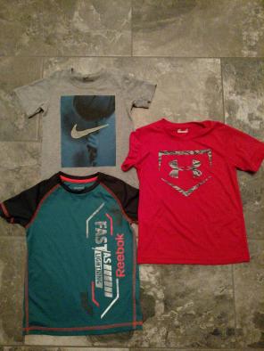 3- size 5 tees- Nike, UA, Reebok