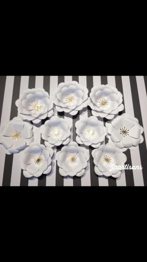All white paper flower/back drop Gold