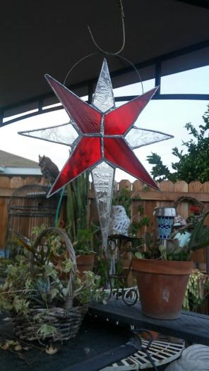 Frosted clear glass w/ red Northern star