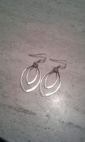 Genuine 1.5" .925ss 4pc hoop earrings.