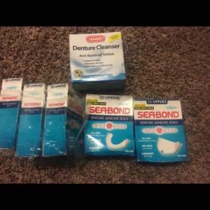 Denture adhesive seals and cleaner lot