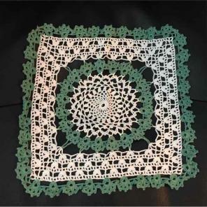 Beautiful vintage green and white doily