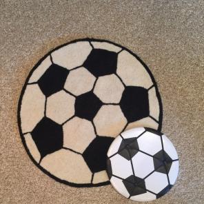 Soccer room decor rug and photo board
