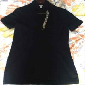 Burberry women's polo. Size medium