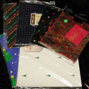 6 pks wrapping paper HOLD