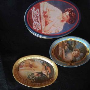 Assorted tin Coca Cola tray an canister