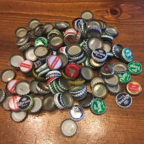 Approximately 130 used beer bottle caps