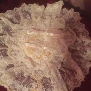 White & ivory heart wedding ring pillow.