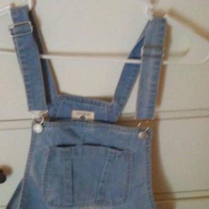 Distressed women's jeans overall