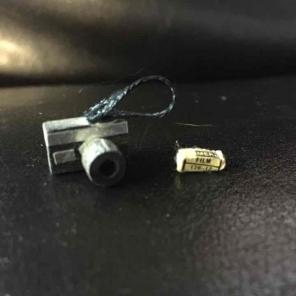 Miniature camera and film