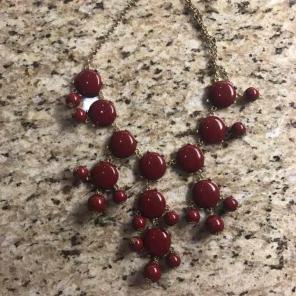 Bundle of maroon and black bib necklaces