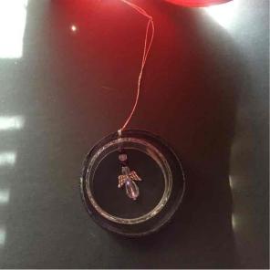 Purple and white glass angel ornament