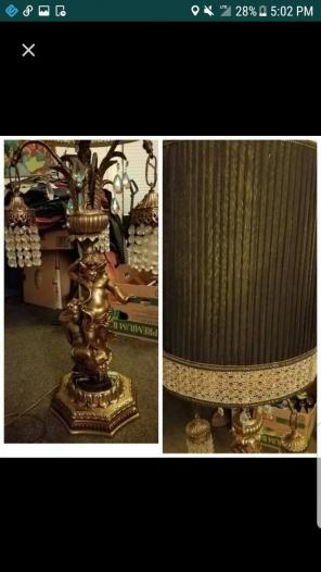 2 Brass cherub lamps with hanging prisms