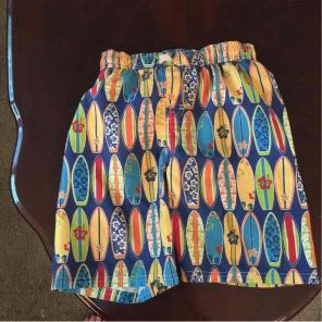 Size 7 surfboard boys swim trunks