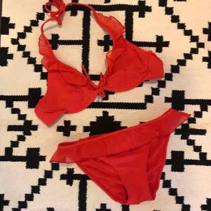 Red halter bikini set and sarong