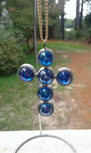 Pretty Blue Worry Cross out of Marbles
