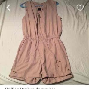 Medium nude romper never worn.