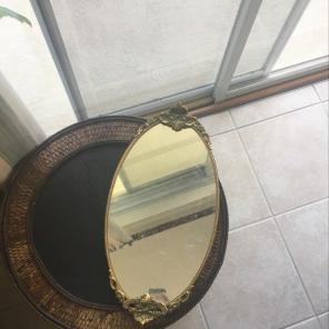 gold colored mirror with amazing details