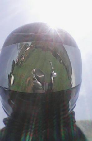 Black motorcycle helmet with mirror tint