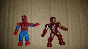 battle damaged Spider-Man and Iron Man