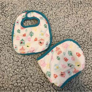 Nicole miller bib and burp cloth