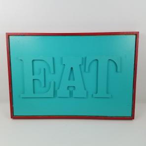 Eat sign turquoise and red wall decor