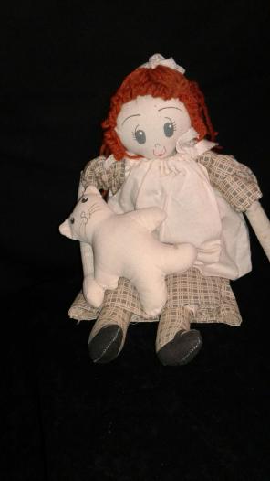 Vintage handmade rag doll with teddy
