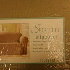 Loveseat cover, New in package