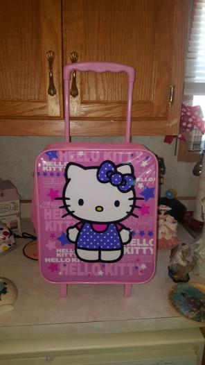 Hello Kitty luggage on wheels