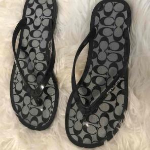 Coach flip flops
