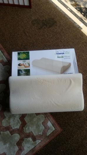 2 New Tempurpedic Neck Pillow pillows