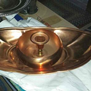 Bright copper tray and candlestick