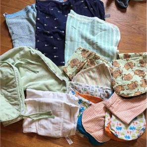 Boppy cover, blankets, burp cloths
