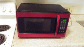 Red and black microwave oven