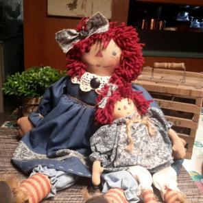 Raggedy Ann with her mini me dolly