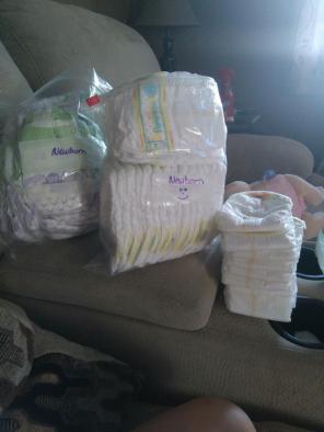 Newborn Diapers 62 total