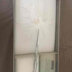 Wedding guest book and pen with holder