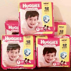 145 Huggies Snug N Dry Diapers Size 4