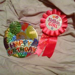 Two happy birthday pins