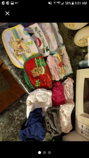 17 baby bibs and 6 diaper covers