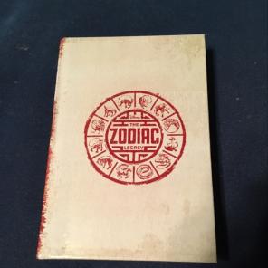 THE ZODIAC LEGACY BOOK ONE (HARD COVER)