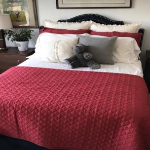 Red Coverlet Set With Matching Shams.