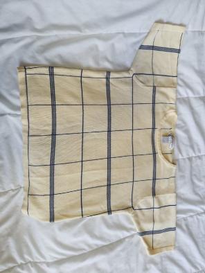Pastel yellow/navy blue .Tile pattern.