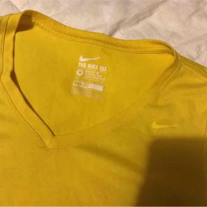 Yellow Nike shirt