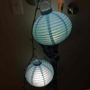 TWO Light up hanging lanterns.