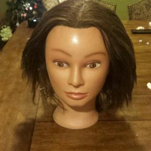 Manequi head, human hair.