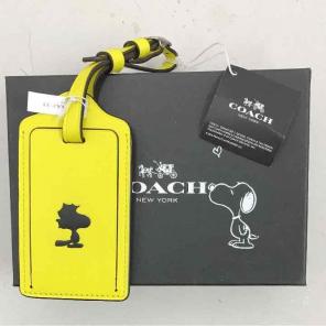 Coach Peanuts Woodstock luggage tag