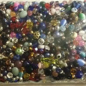 3inx4in bag of small glass beads &other